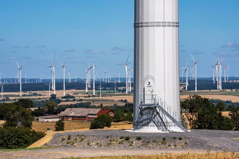Wind power plants east of Lichtenau, in front of that a new wind turbine near Bad Wünnenberg