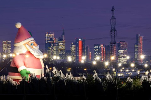 In a Christmas tree center near Frankfurt am Main, a multi-metre-high inflated figure of Santa