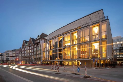 Hamburg State Opera (with Monster's Paradise façade) at blue hour with illuminated stripes of