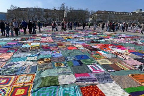 VIVA VITTORIA - Knitting against violence against woman at Friedrichsplatz in Kassel, Germany