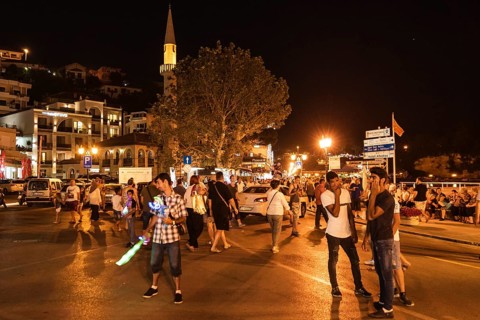 ULCINJ, MONTENEGRO - JUNE 22, 2019: Nightlife ine the city with crowd of people during summer