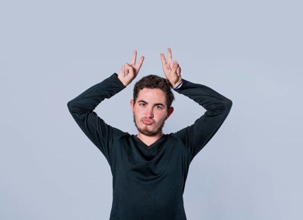 Man with fingers cuckolding, concept of infidelity, man with fingers cuckolding, concept of