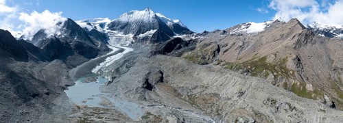 Aerial view, Alpine panorama, mountain landscape with glacier tongue and glacier lake, Glacier de
