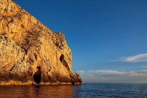 Evening light, Boat tour, View from the sea, Bizarre rock formations, Rugged mountains, Marettimo,