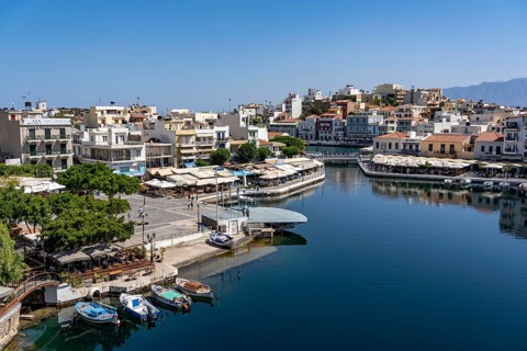 The village of Agios Nikolaos, in the eastern part of Crete, view over Lake Voulismeni, connected