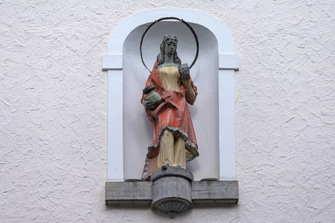 Sculpture of Saint Verena at the church of the same name, Fischen, Allgäu, Bavaria, Germany