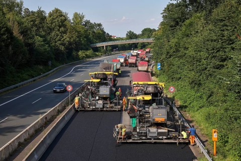 Essen, North Rhine-Westphalia, Germany, Road construction, Asphalt pavers and road rollers lay new,