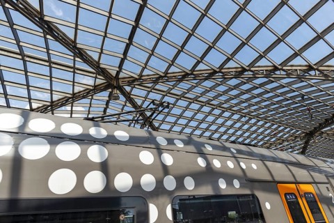 Local train and glass roof at Cologne Central Station, Cologne, Rhineland, North Rhine-Westphalia,