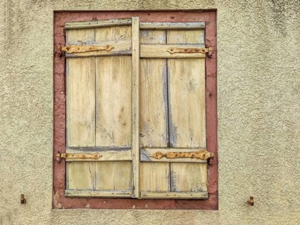Yellow house wall, window with closed yellow shutters, Rhodt unter Rietburg, German or Southern