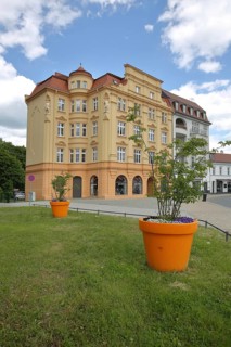 Villa with oversized flower pot, plus size, Bernauer Strasse, Oranienburg, Brandenburg, Germany