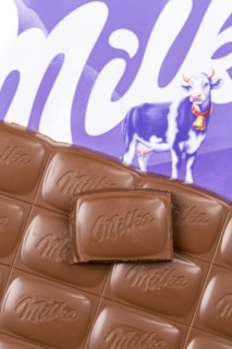 Milka chocolate bar Alpine milk chocolates with logo in Stuttgart, Germany