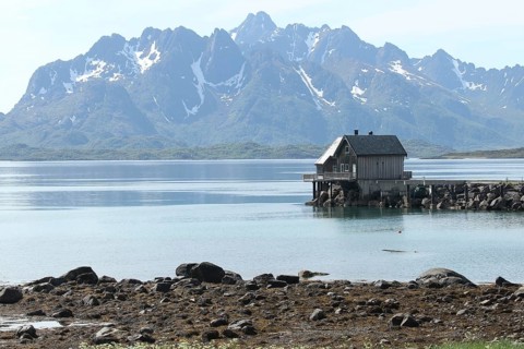 Fishing hut in a fjord in the Lofoten Islands, Norway, Scandinavia
