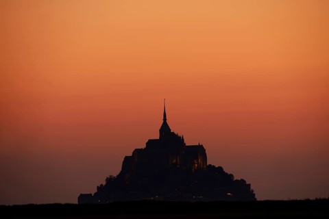 Le Mont-Saint-Michel at sunset, Benedictine monastery, Manche department, Normandy, France