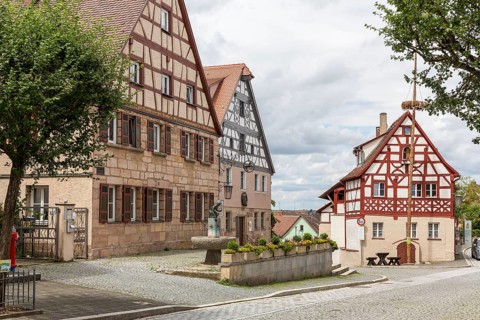 Historic market square with Brestla fountain, Cadolzburg, Bavaria, Germany