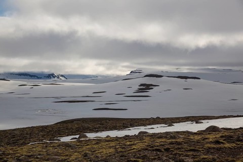 Snowfields at the Heidarvatn lake between Seydisfjördur and Eglisstadur in E Iceland