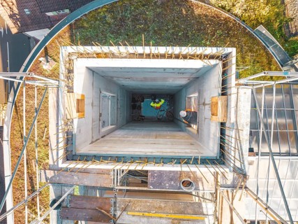 Construction work on a tower with scaffolding, taken from the air in oblique perspective, ZOB Calw