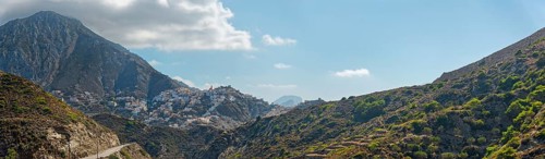 Picturesque village of Olymbos in the middle of a mountainous landscape with picturesque valleys