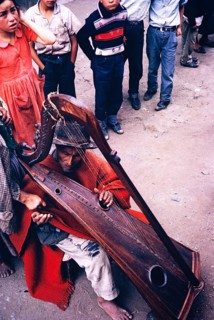 Indian playing the harp, Ecuador, South America, 1962