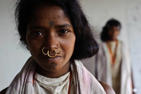 Portrait of a teenage girl from the Dongria kondh tribe, Odisha, India. Different ways of writing :