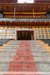 Steps lead to a traditional building in the scenic Zanskar Valley, Ladakh, India. The architectural