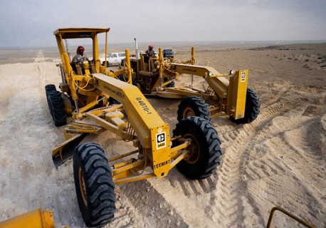 Oil industry in the Ras Tanura area, Saudi Arabia, 14G Tracked vehicles in desert construction 1979