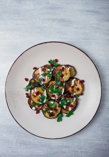 Fried eggplant, with white sauce, pomegranate seeds, top view, no people