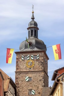 Town tower of Buchen in the Odenwald, gate tower, flags with town coat of arms. Buchen,