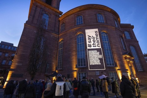 A memorial service is held in front of St Paul's Church in Frankfurt am Main for the victims of the