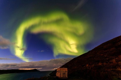 Northern Lights, (Aurora borealis) at a fjord in the Barents Sea near Bugoynes, September 2024,
