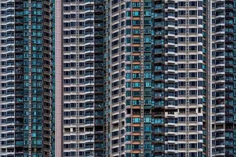 A striking architectural photography capturing the dense and detailed facade of modern high-rise