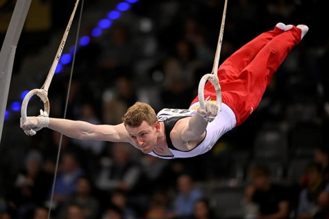 Nils Dunkel GER rings action gymnastics, EnBW DTB-Pokal, Porsche-Arena, Stuttgart,