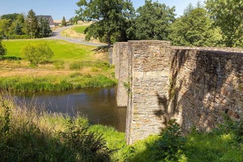 Historic old bridge over the Freiberger Mulde in Halsbrücke, Saxony, Germany