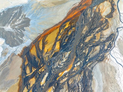 Top view of an intricate abstract landscape showing natural textures. This image, captured by a