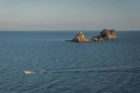 Boat on the Adriatic Sea and Islands Sveta Nedjelja and Katic in Montenegro