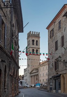 Torre del Popolo and Church of Santa Maria sopra Minerva, Piazza del Comune, Assisi, Umbria, Italy