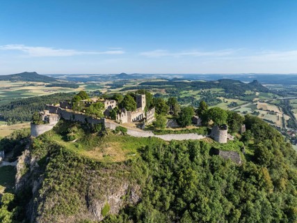 Aerial view of the Hohentwiel volcanic cone with Germany's largest fortress ruin, in the morning