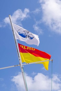 Flags, DLRG, Strand, Langeoog, East Frisia, Lower Saxony, Germany