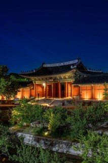 Myeongjeongmun Gate illuminated at night, entrance to the main hall of the 15th century