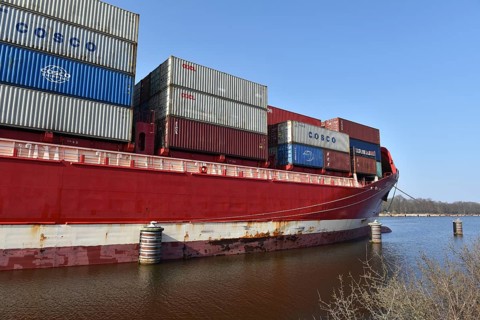 Averaged container ship FREDERIK stands at the dolphins in the Kiel Canal, Kiel Canal, Kiel Canal,