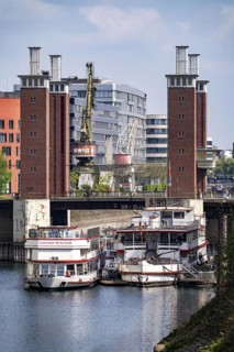 The Schwanentor bridge in the inner harbour of Duisburg, one of 3 lifting bridges, can be raised up