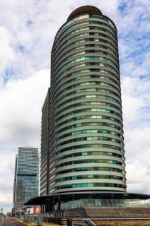 World Port Center, a distinctive skyscraper on Wilhelminapier in the harbor, by British architect