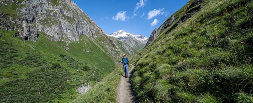 Mountaineer on hiking trail, Umbaltal, Venediger Group, Hohe Tauern National Park, East Tyrol,