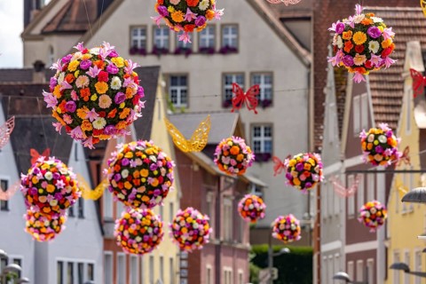 Flower decorations, flower balls over the streets of Ellwangen, Baden-Württemberg, Germany