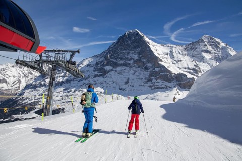 Skiing against the backdrop of the north face of the Eiger in Grindelwald, Switzerland