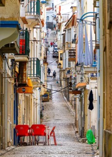 Typical Mediterranean architecture with small narrow streets and streets, Nazare, Portugal