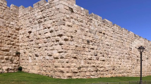 Jerusalem Old City Walls close to main entrance Damascus gate, main tourist attraction