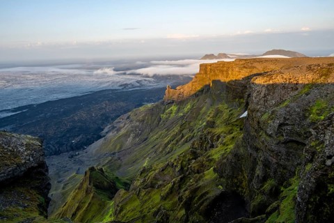 Cliff in the evening light, Impressive landscape with mountains and glaciers, Huldujökull and