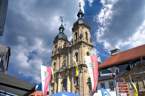 Parish and pilgrimage church of the Holy Trinity, basilica in Gößweinstein with pilgrimage flags,