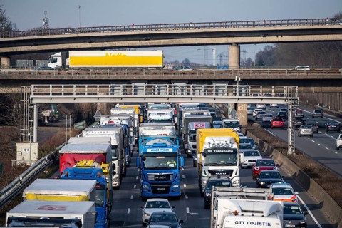 Traffic jam on the A3 motorway, at the Köln-Ost junction, heading south, four lanes jammed with