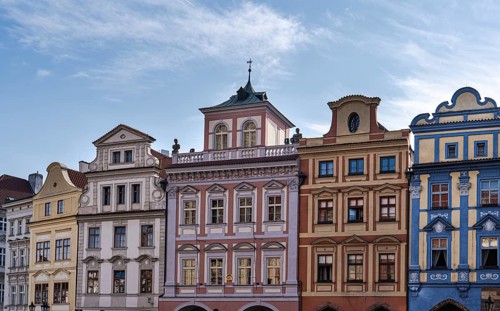 Discover the charm of Prague's historical architecture with colorful old buildings and intricate